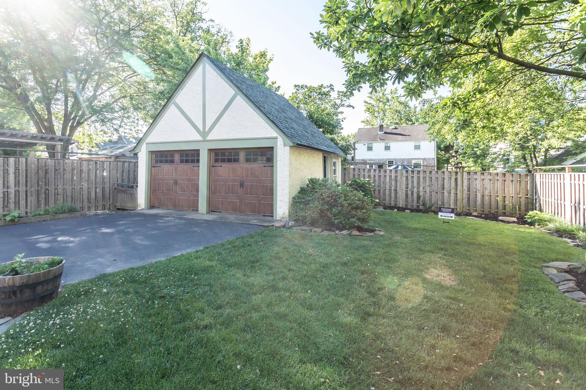 105 West Clearfield Road Havertown, PA 19083 - Photo 52 of 56 a front view of a house with yard and tree