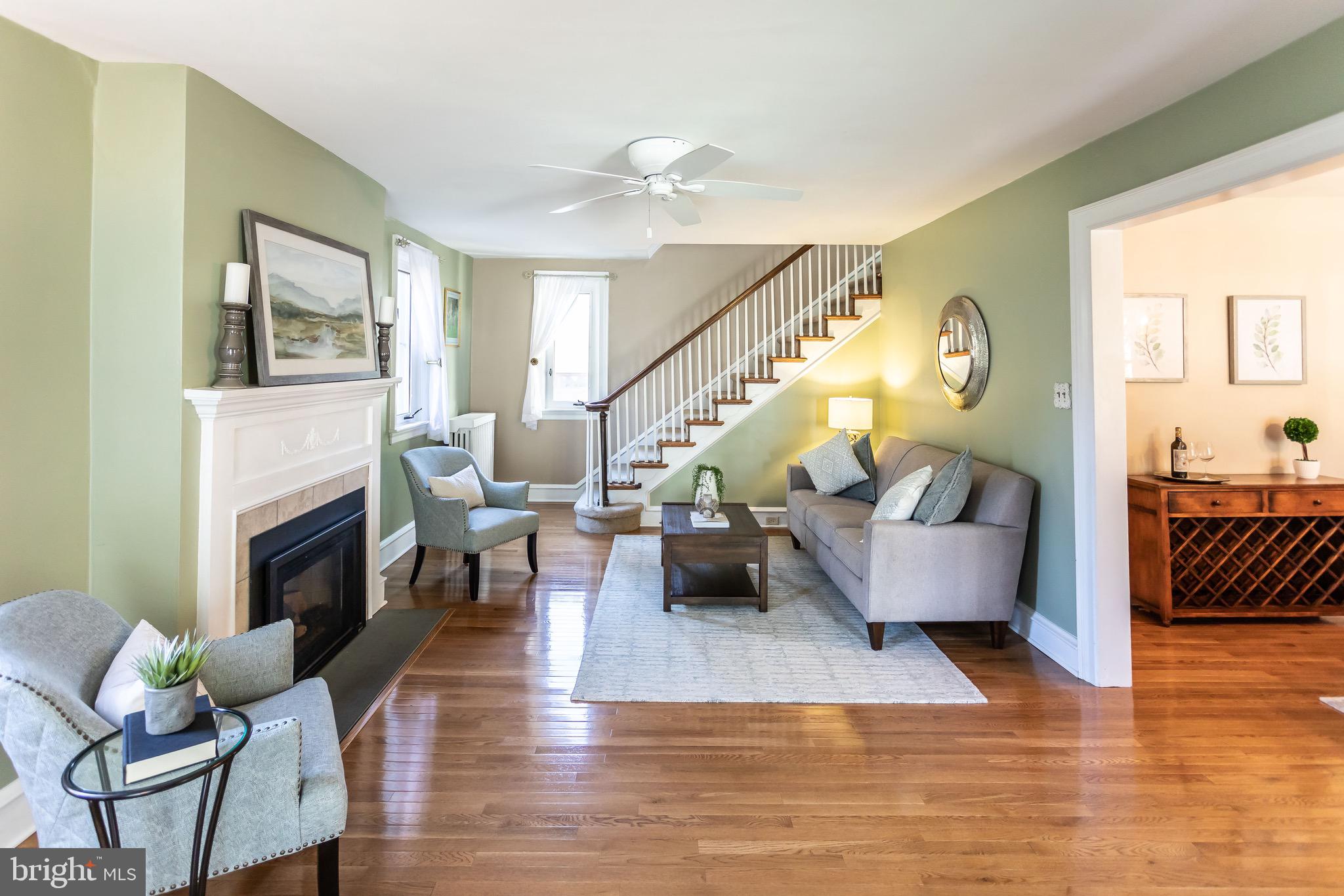105 West Clearfield Road Havertown, PA 19083 - Photo 8 of 56 a living room with furniture and a fireplace