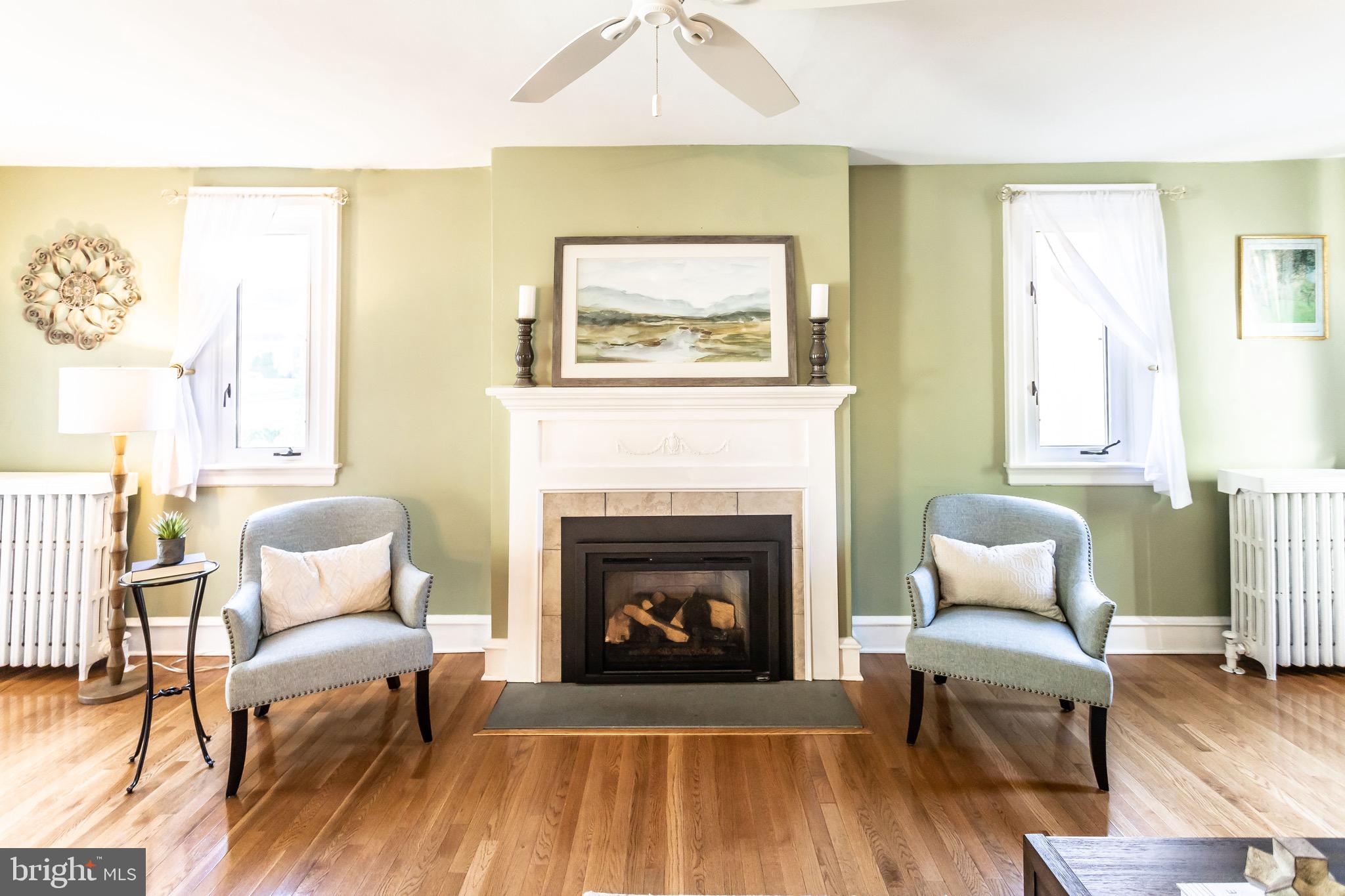 105 West Clearfield Road Havertown, PA 19083 - Photo 9 of 56 a living room with furniture and a fireplace