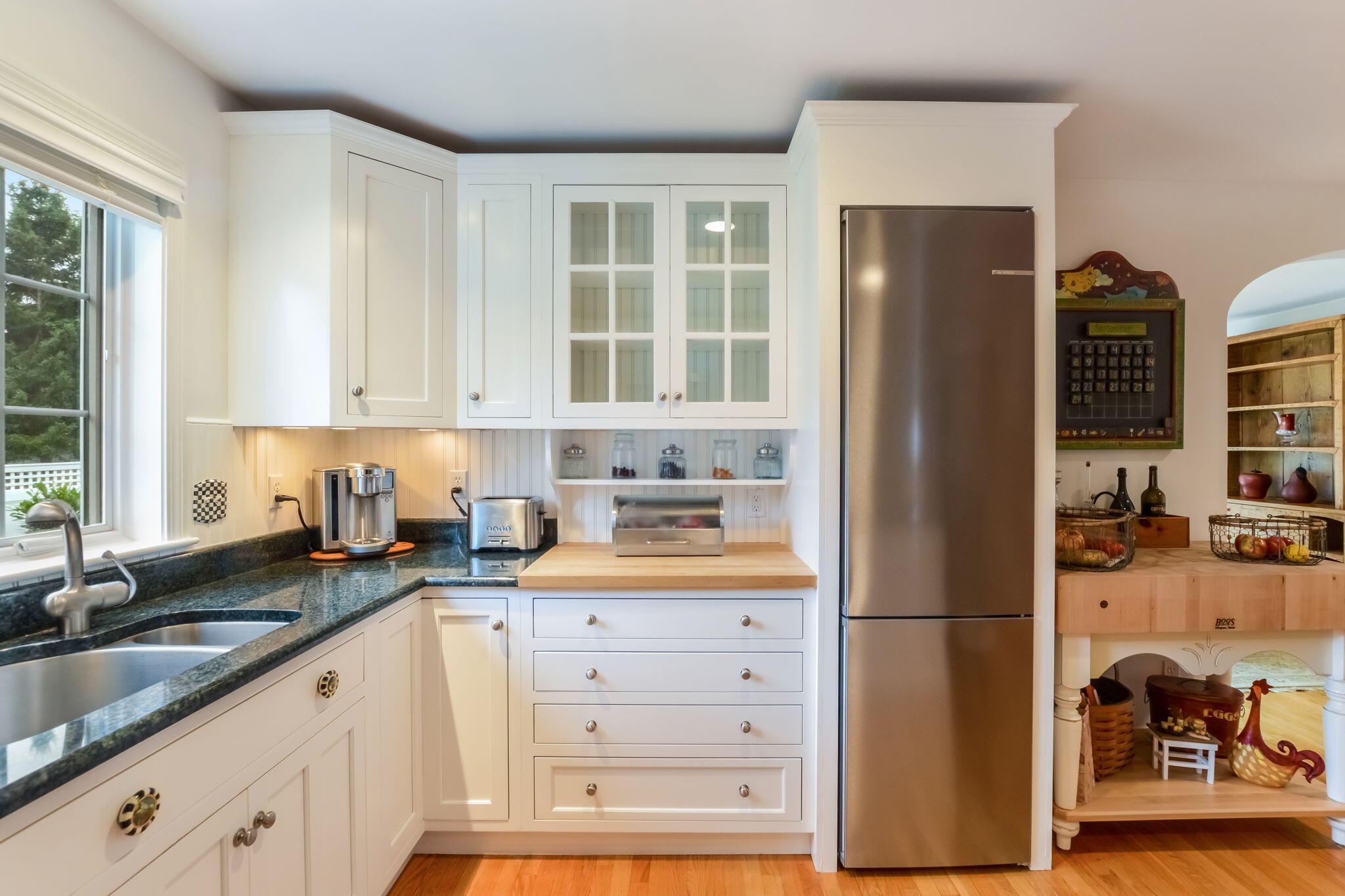 195 Cotuit Road, Unit 8 Marstons Mills, MA 02648 - Photo 13 of 46 a kitchen with granite countertop a refrigerator and a sink