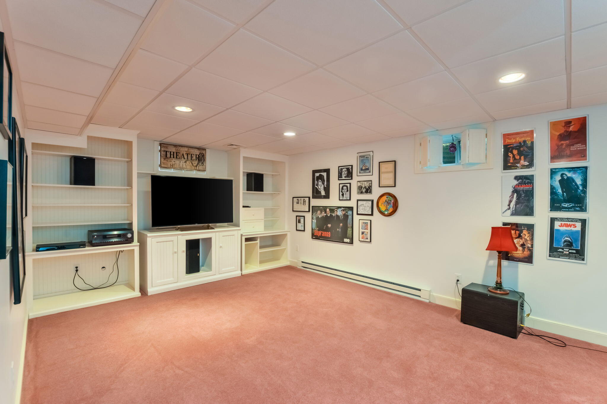 195 Cotuit Road, Unit 8 Marstons Mills, MA 02648 - Photo 35 of 46 a living room with furniture and a flat screen tv