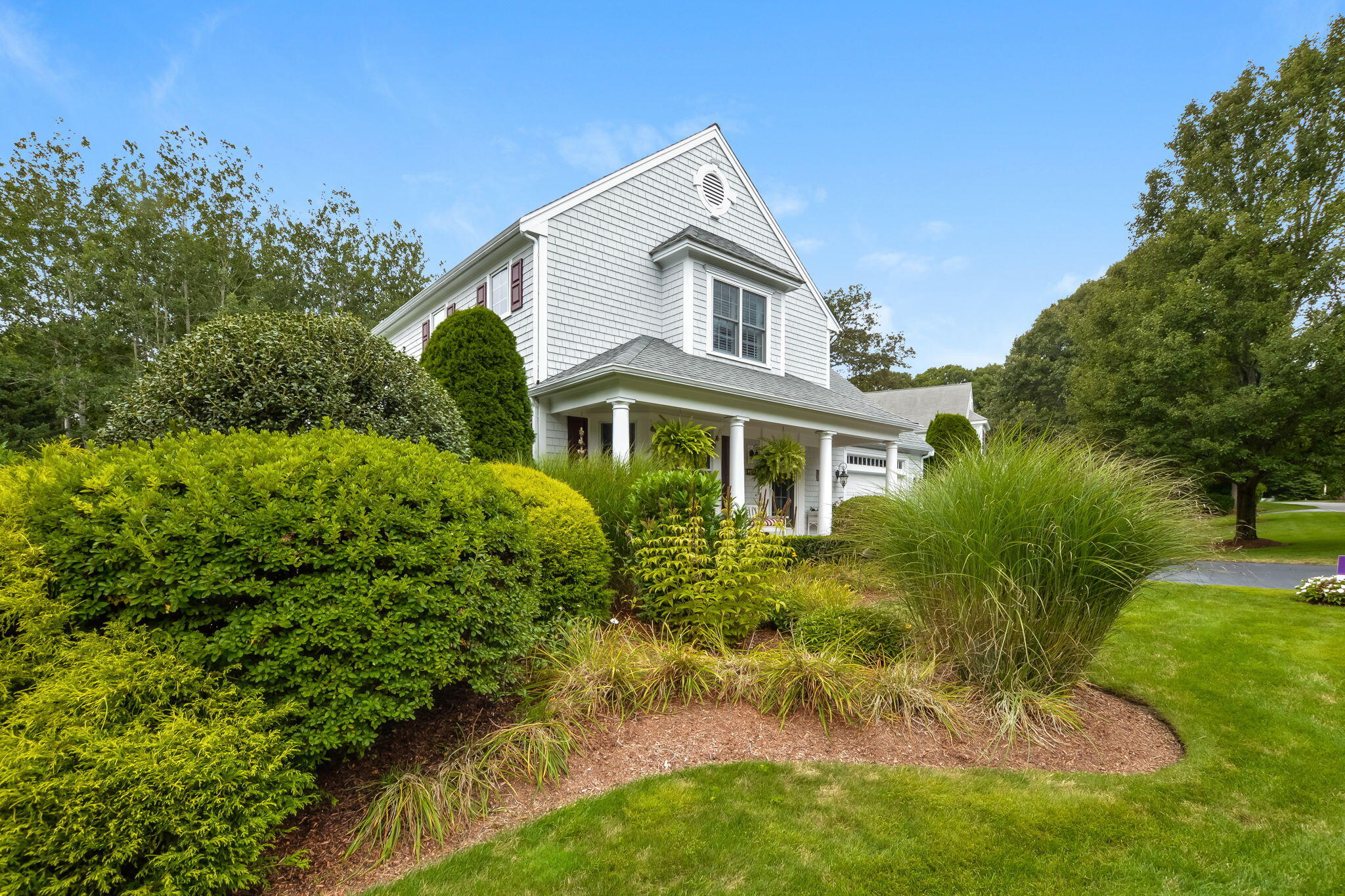 195 Cotuit Road, Unit 8 Marstons Mills, MA 02648 - Photo 45 of 46 a view of a yard in front of house