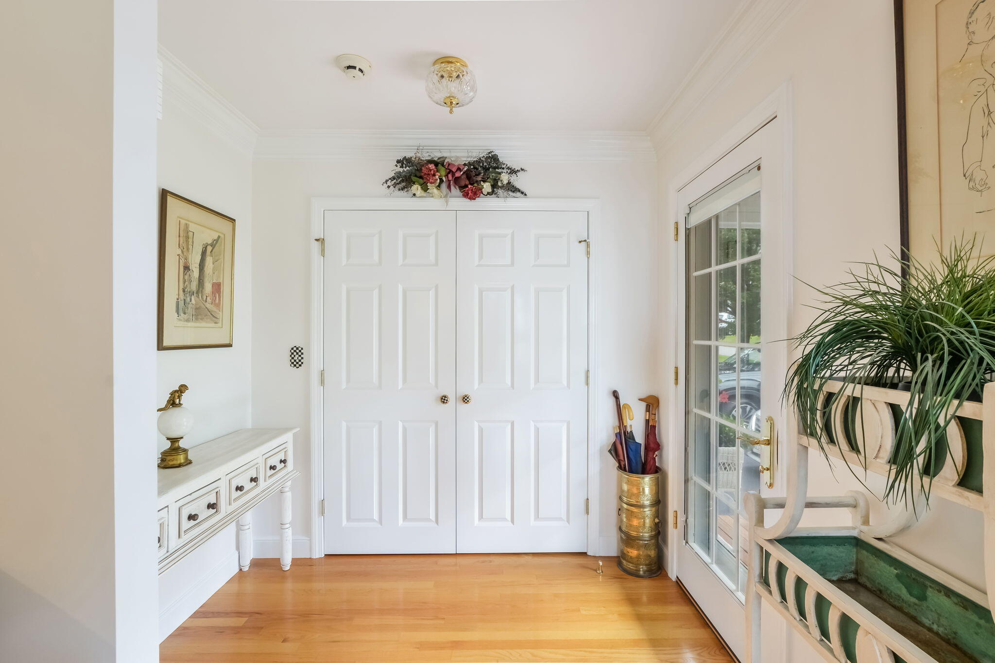 195 Cotuit Road, Unit 8 Marstons Mills, MA 02648 - Photo 6 of 46 a view of walk in closet with clothes and shoes