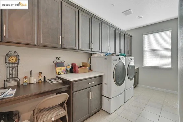 a kitchen with stainless steel appliances granite countertop a sink and a stove