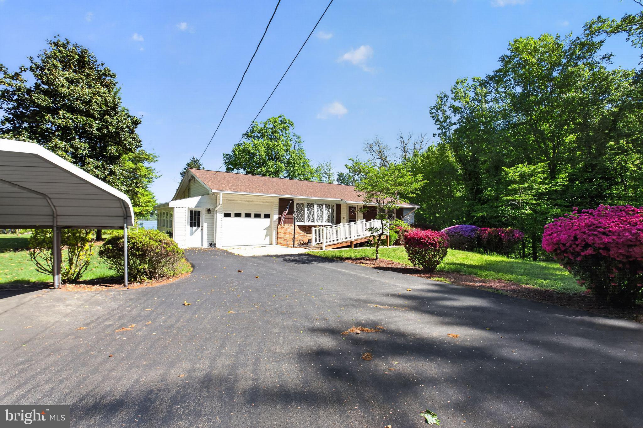 5480 Grinder Road Marbury, MD 20658 - Photo 6 of 44 Charming home amidst lush greenery.