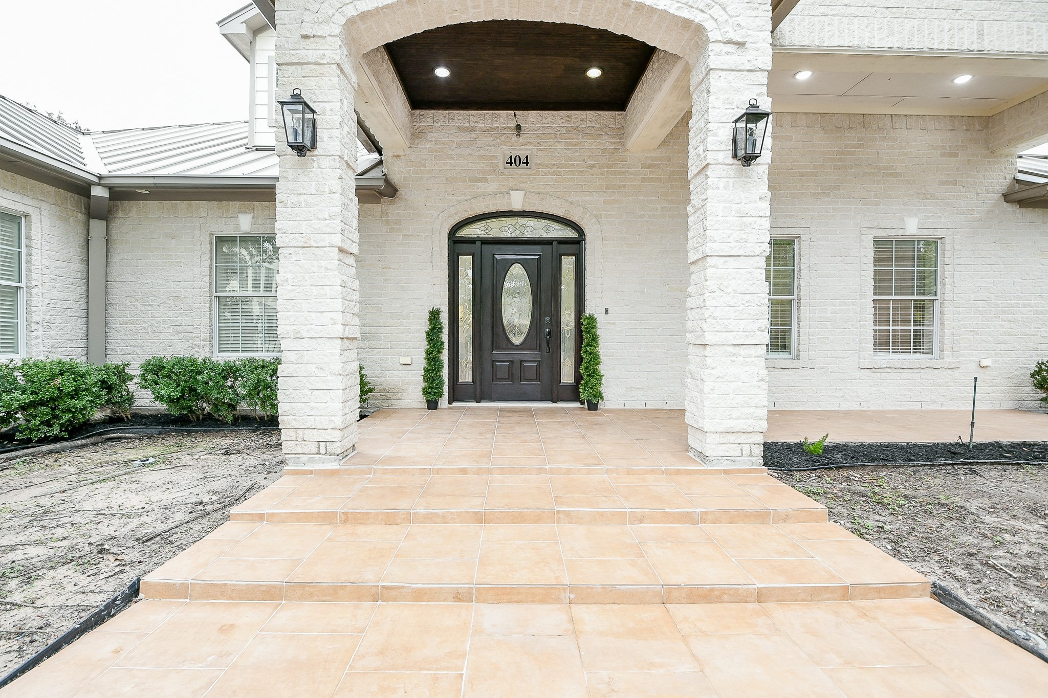 404 Moss Street Houston, TX 77009 - Photo 1 of 40 a front view of a house with a garden