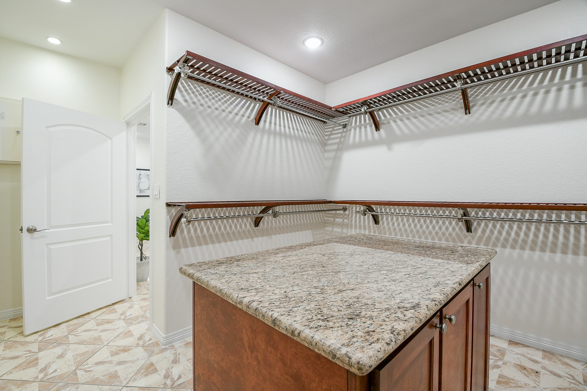 404 Moss Street Houston, TX 77009 - Photo 12 of 40 a utility room with a table and chairs