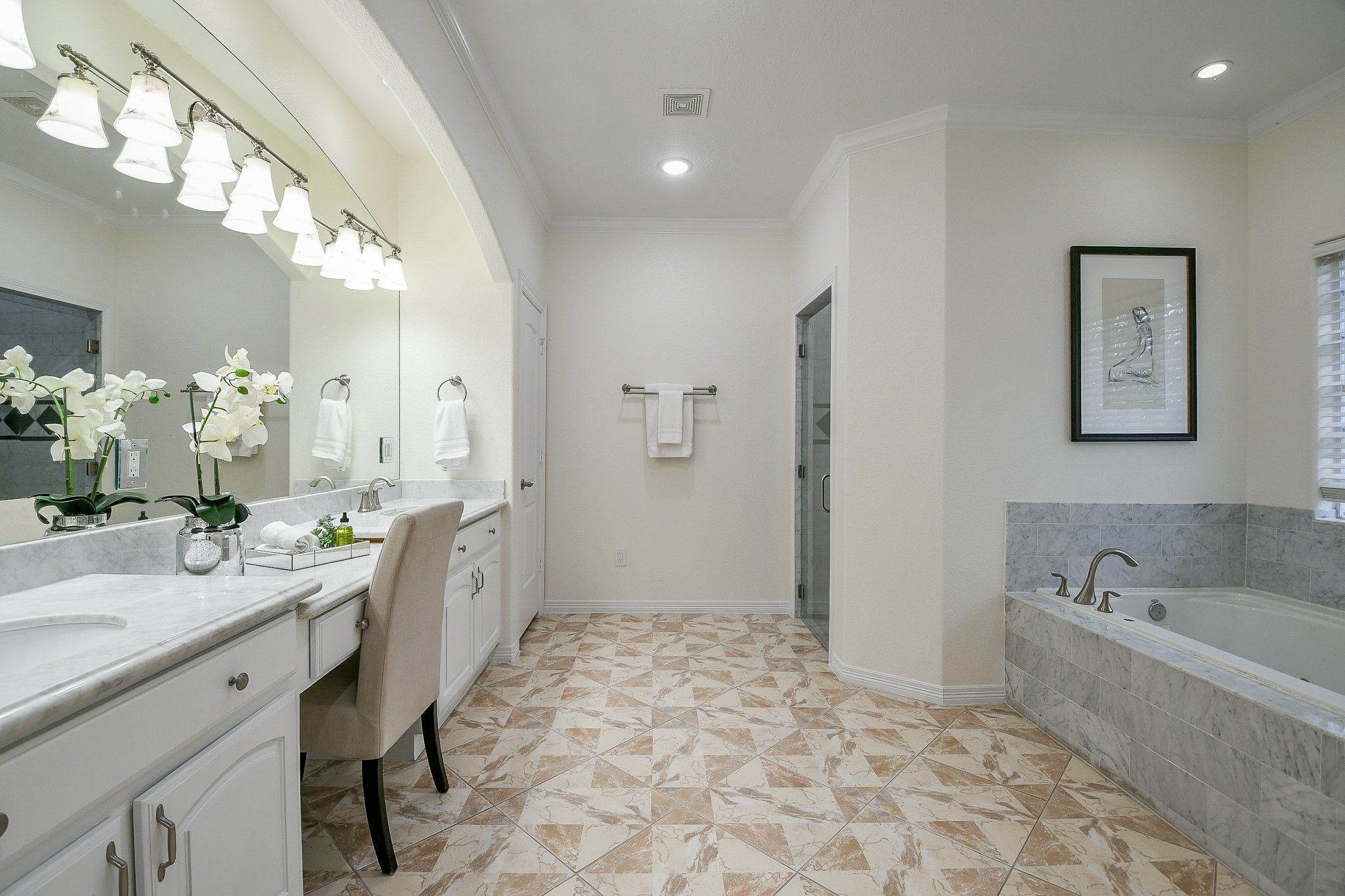 404 Moss Street Houston, TX 77009 - Photo 13 of 40 a spacious bathroom with a sink mirror and a bath tub