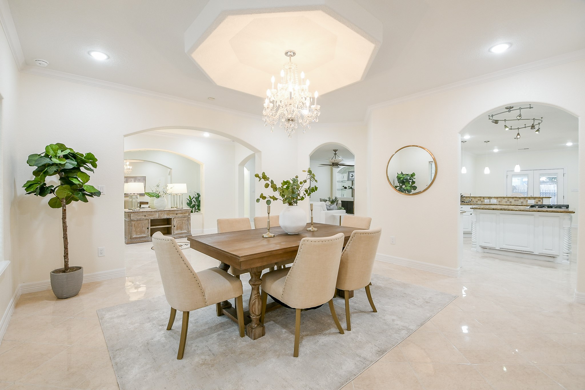 404 Moss Street Houston, TX 77009 - Photo 7 of 40 a view of a dining room with furniture and a chandelier