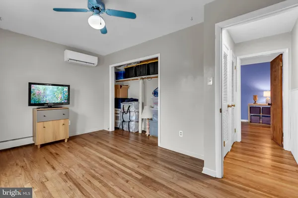 a view of a wooden deck with a bench