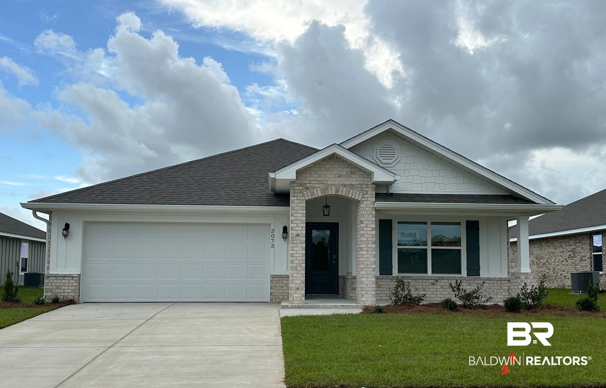 3073 Ingrid Lane Foley, AL 36535 - Photo 1 of 17 View of front of property with a garage, a front yard, and central AC
