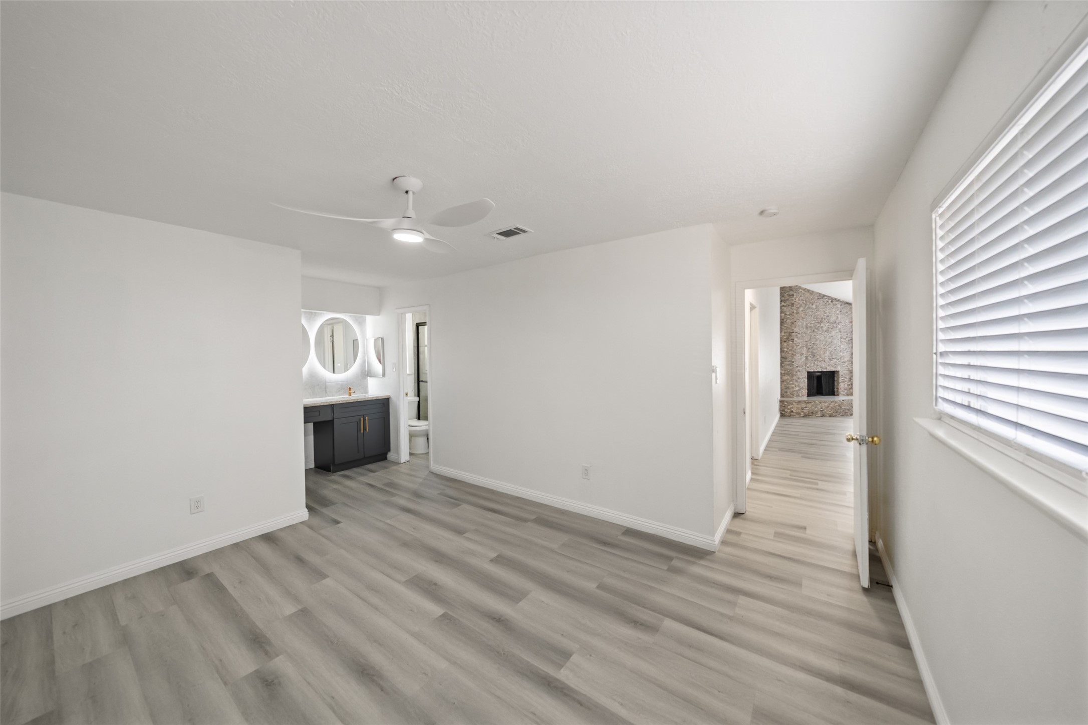 5726 Yorkgate Drive Spring, TX 77373 - Photo 16 of 20 a view of an empty room with wooden floor