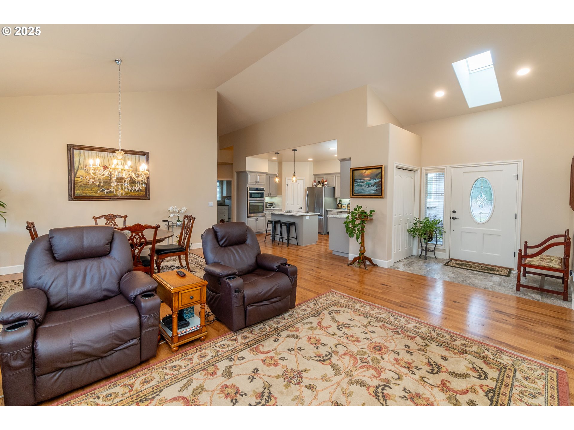 8830 Merlin Drive Redmond, OR 97756 - Photo 7 of 32 a living room with furniture and wooden floor