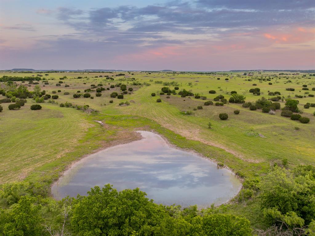 12069 Fm-1602 Hamilton, TX 76531 - Photo 4 of 32 Aerial view at dusk of a view of countryside and a water view