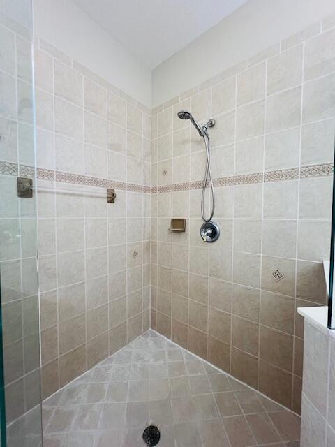 30 Beechdale Lane Boynton Beach, FL 33426 - Photo 14 of 25 a bathroom with a shower