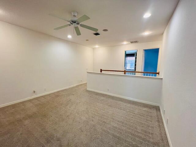 30 Beechdale Lane Boynton Beach, FL 33426 - Photo 17 of 25 an empty room with ceiling fan and window