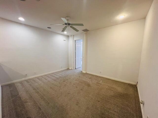 30 Beechdale Lane Boynton Beach, FL 33426 - Photo 18 of 25 an empty room with a ceiling fan and fan