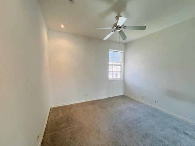 30 Beechdale Lane Boynton Beach, FL 33426 - Photo 21 of 25 an empty room with a window and a fan