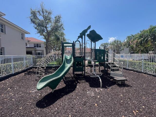 30 Beechdale Lane Boynton Beach, FL 33426 - Photo 23 of 25 a view of a house with backyard and sitting area