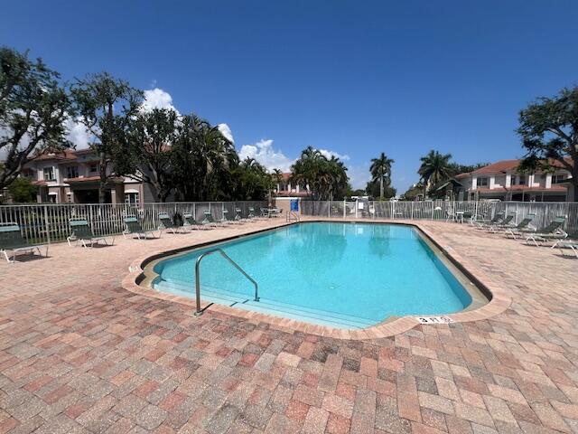 30 Beechdale Lane Boynton Beach, FL 33426 - Photo 25 of 25 a view of outdoor space with swimming pool and lounge chair