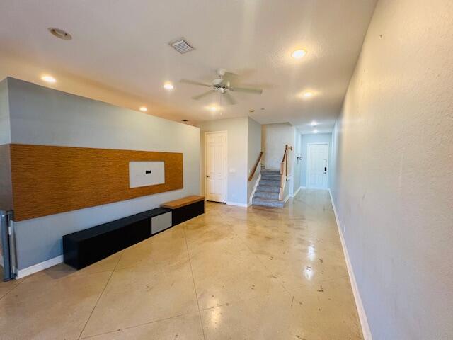 30 Beechdale Lane Boynton Beach, FL 33426 - Photo 3 of 25 a view of a projector room with a table and a projector screen