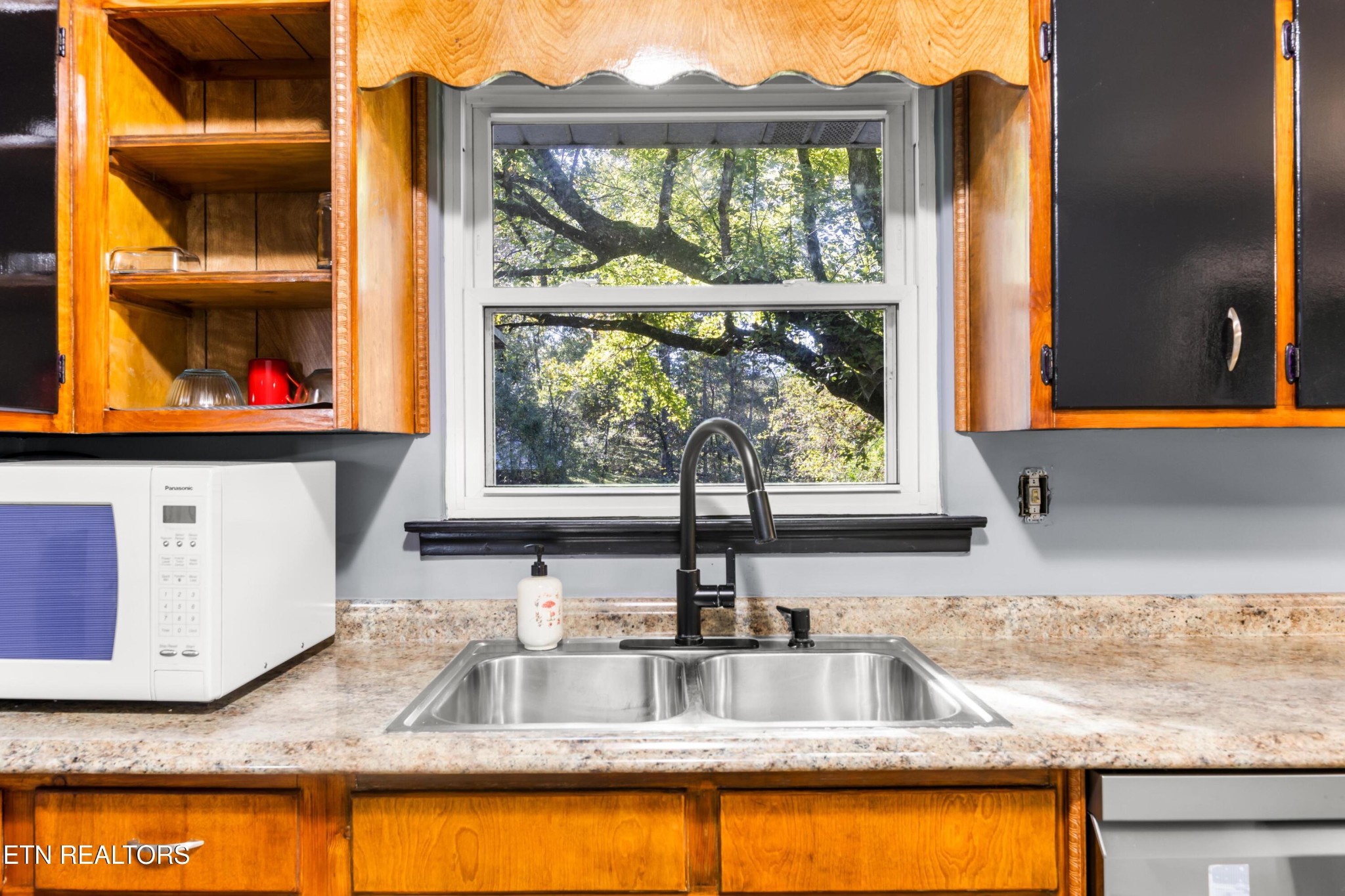 657 Robertsville Road Oak Ridge, TN 37830 - Photo 12 of 28 a kitchen with a sink and a window