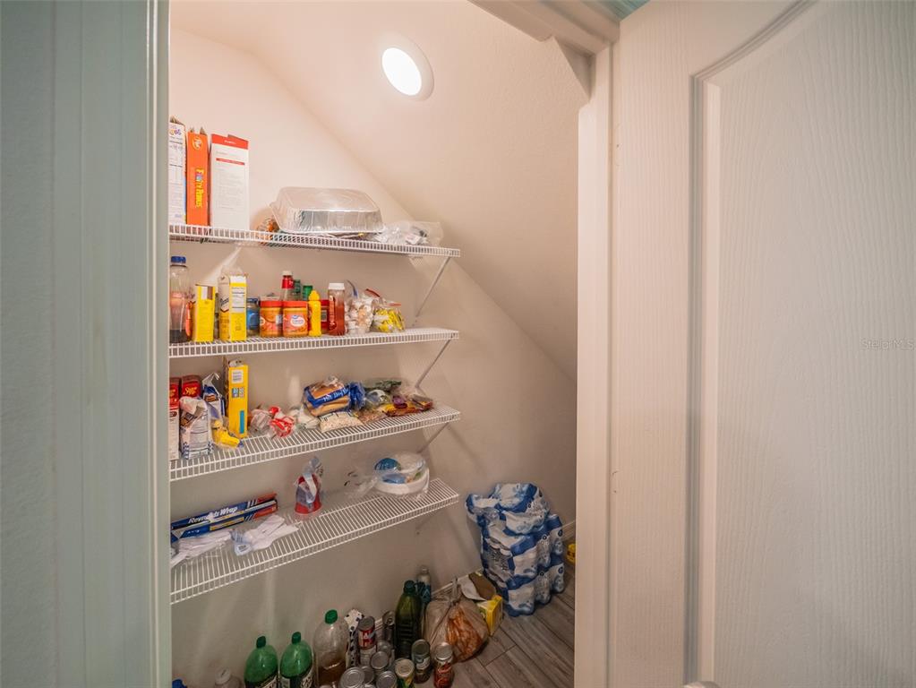 938 Mansfield Road Tavares, FL 32778 - Photo 21 of 25 a room with toys and wooden floor