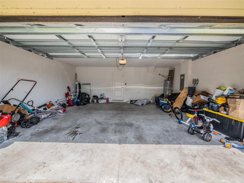 938 Mansfield Road Tavares, FL 32778 - Photo 22 of 25 a view of a room with gym equipment