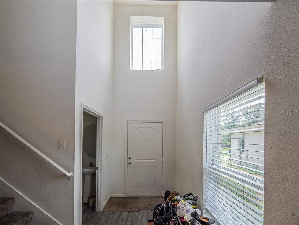 938 Mansfield Road Tavares, FL 32778 - Photo 3 of 25 a view of a livingroom with a window