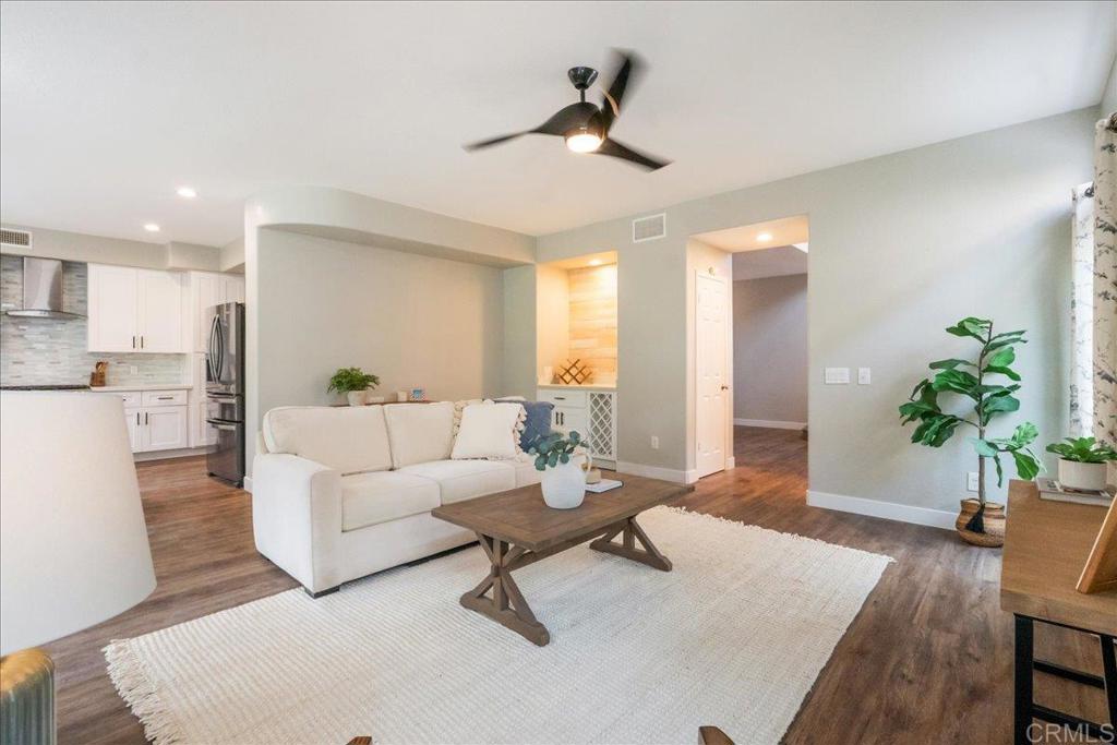 3631 Via Bernardo Oceanside, CA 92056 - Photo 15 of 38 a living room with furniture and a potted plant