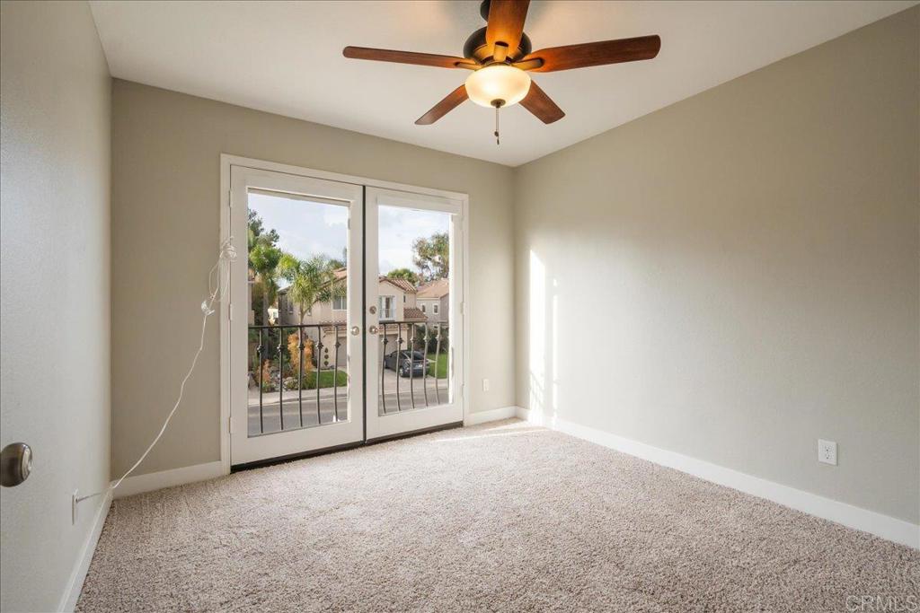 3631 Via Bernardo Oceanside, CA 92056 - Photo 17 of 38 an empty room with windows and entrance