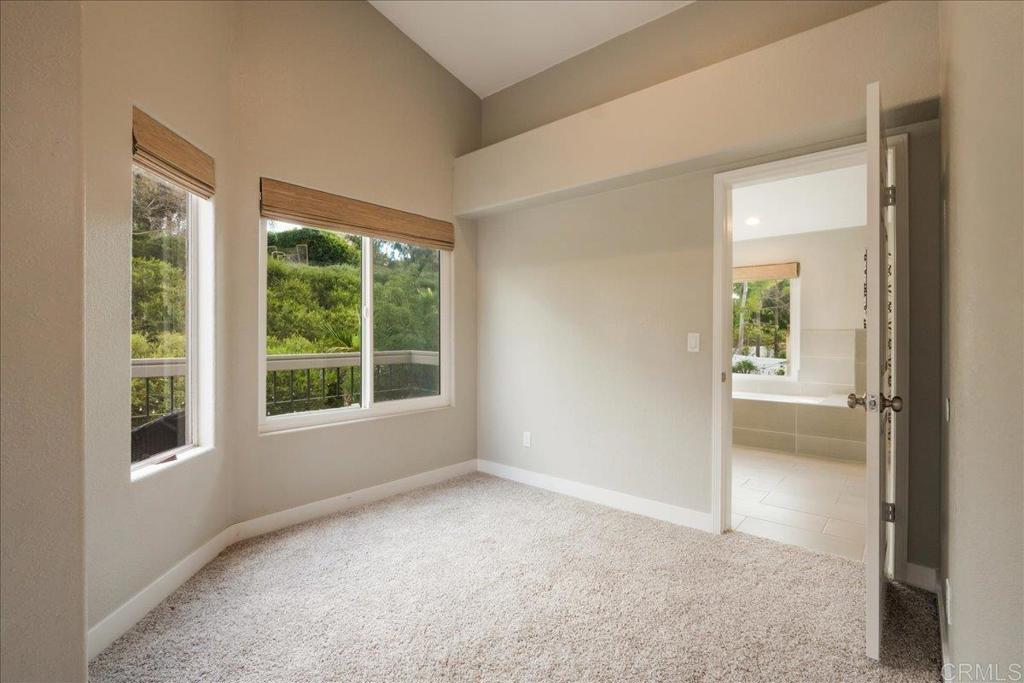 3631 Via Bernardo Oceanside, CA 92056 - Photo 20 of 38 an empty room with windows and closet