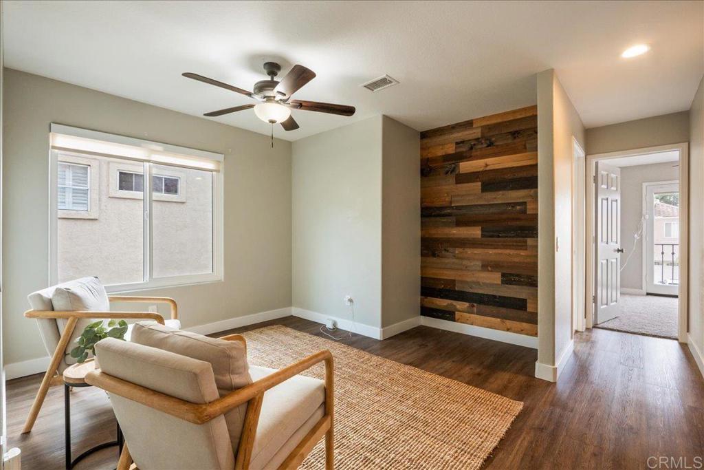 3631 Via Bernardo Oceanside, CA 92056 - Photo 30 of 38 a living room with furniture and wooden floor