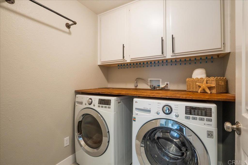 3631 Via Bernardo Oceanside, CA 92056 - Photo 33 of 38 a utility room with dryer and washer