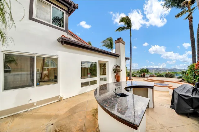 a view of a house with a swimming pool