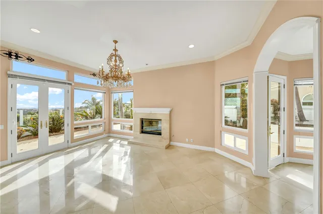 a view of a kitchen with a large window