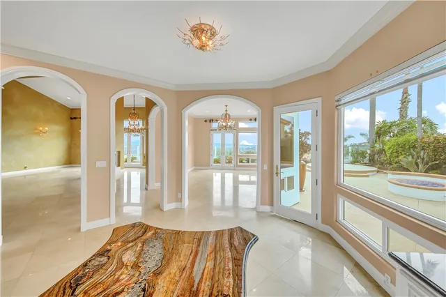 a bathroom with bathtub and window