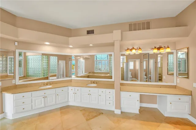 a view of a room that has a large window