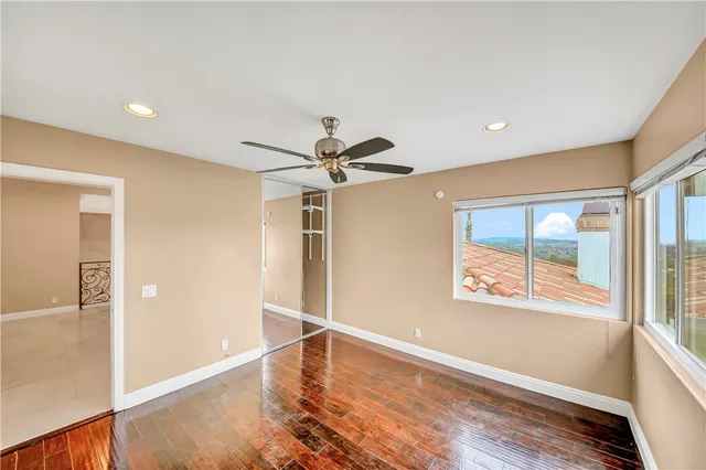 an aerial view of a city with streets and houses
