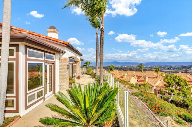 a view of a swimming pool with a lounge chair
