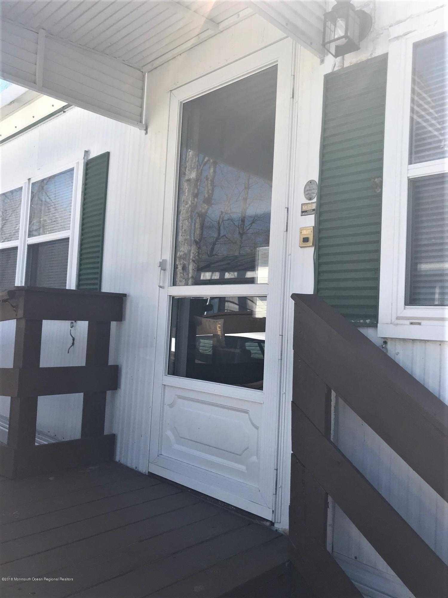 65 Roberts Road Toms River, NJ 08755 - Photo 1 of 24 a view of a entryway of the house