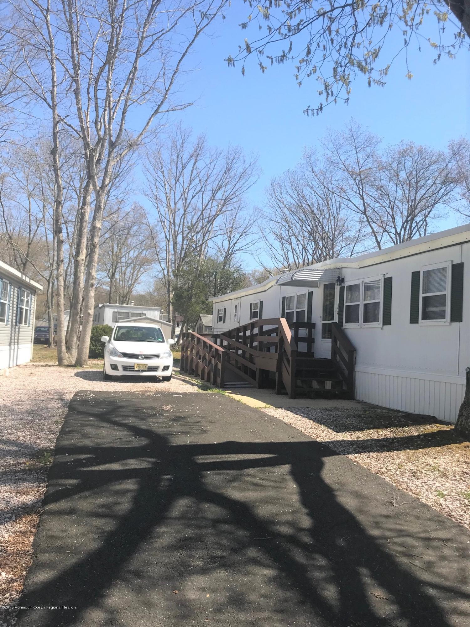 65 Roberts Road Toms River, NJ 08755 - Photo 19 of 24 a view of a house with a yard