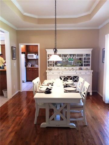 Dining Room w/wood floors and great view of front porch