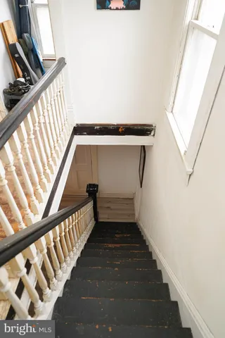 a room with furniture and a window