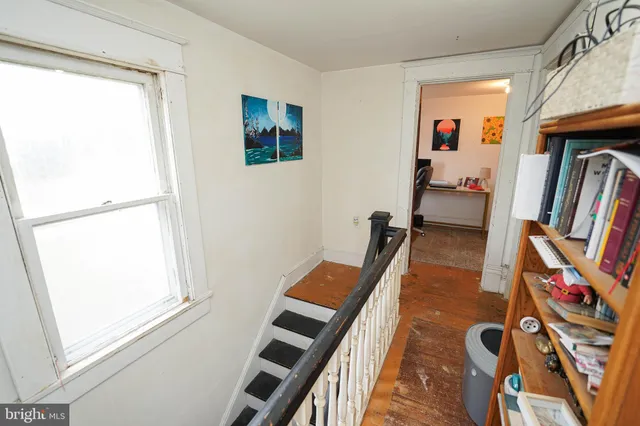 a view of entryway and workspace