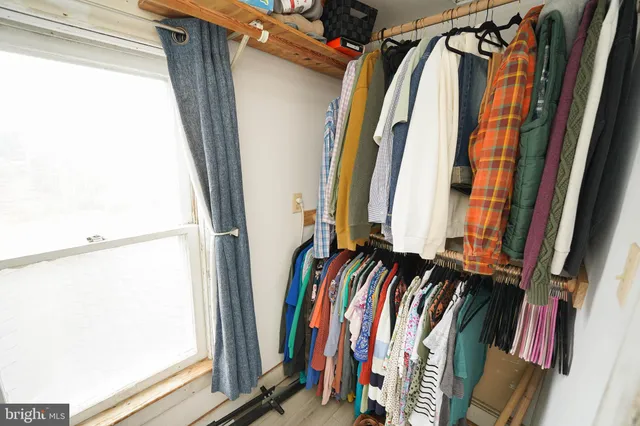 a room with furniture and wooden floor