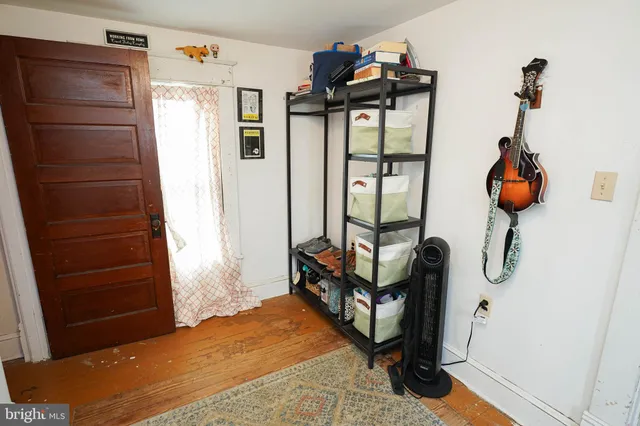 a view of a workspace with furniture and toys