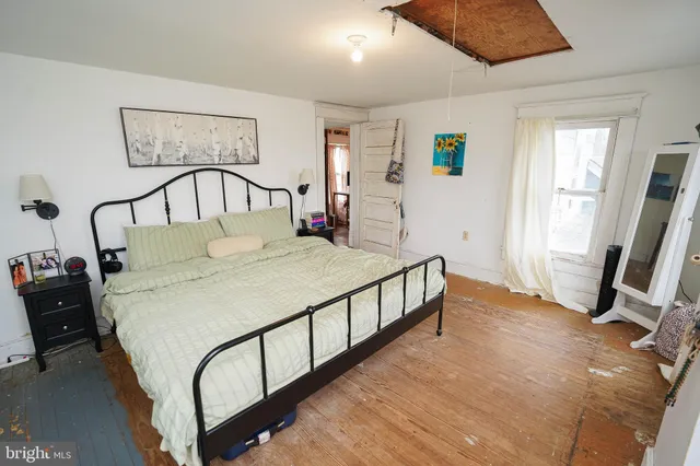 a balcony with table and chairs