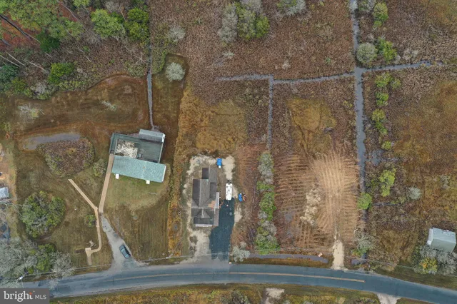 a view of a pool with a yard