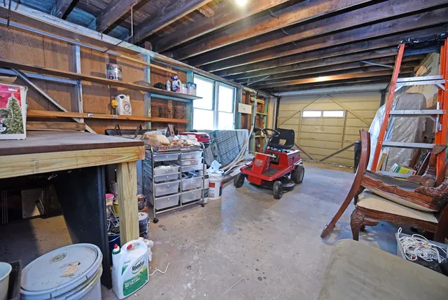 a view of backyard with deck and wooden floor